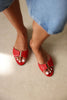RED WOMEN’S SLIPPERS WITH GOLD ACCESSORY DETAIL