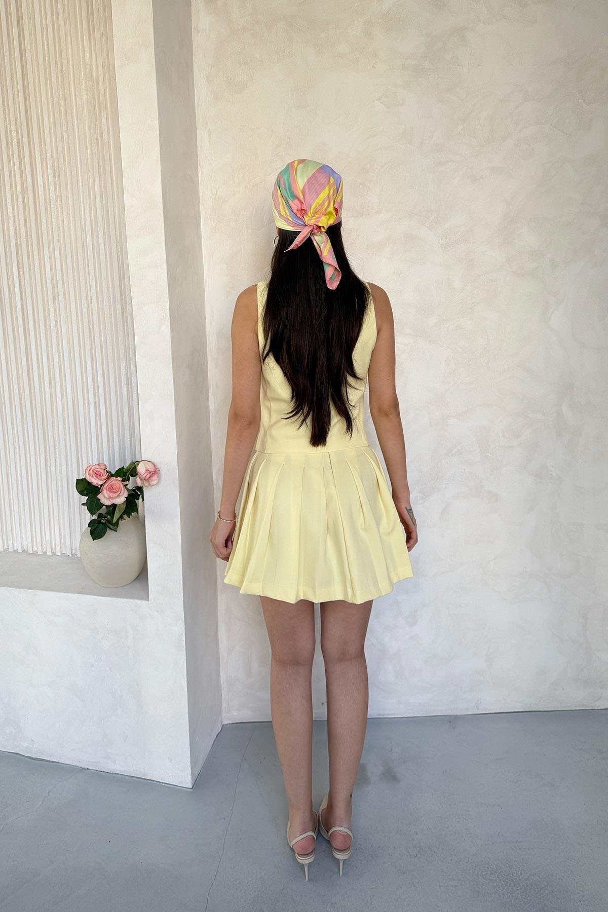 Yellow Pleated Skirt and Vest Set