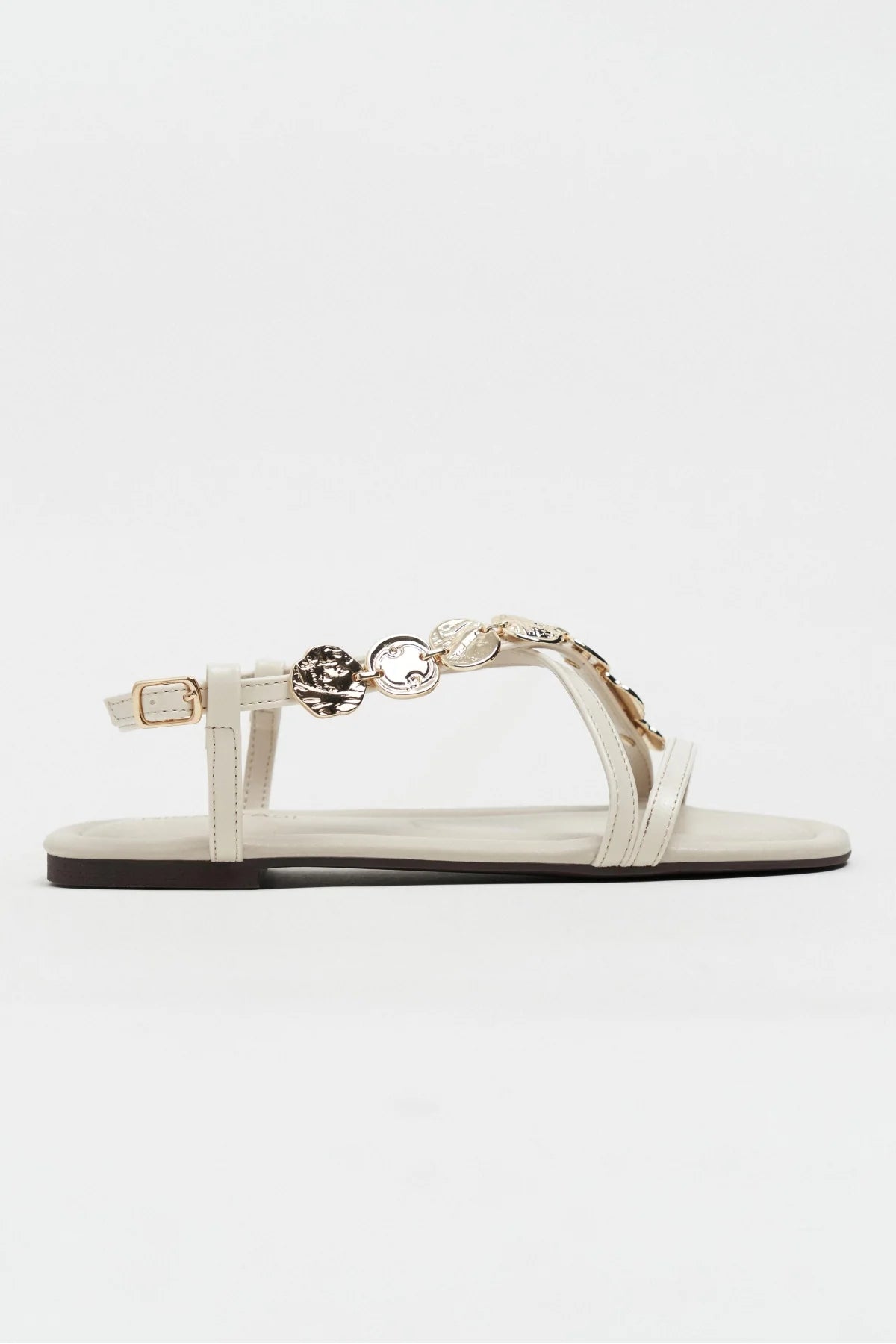 SELENE BEIGE CROSS-STRAP FLAT WOMEN’S SANDALS WITH GOLD ACCENT