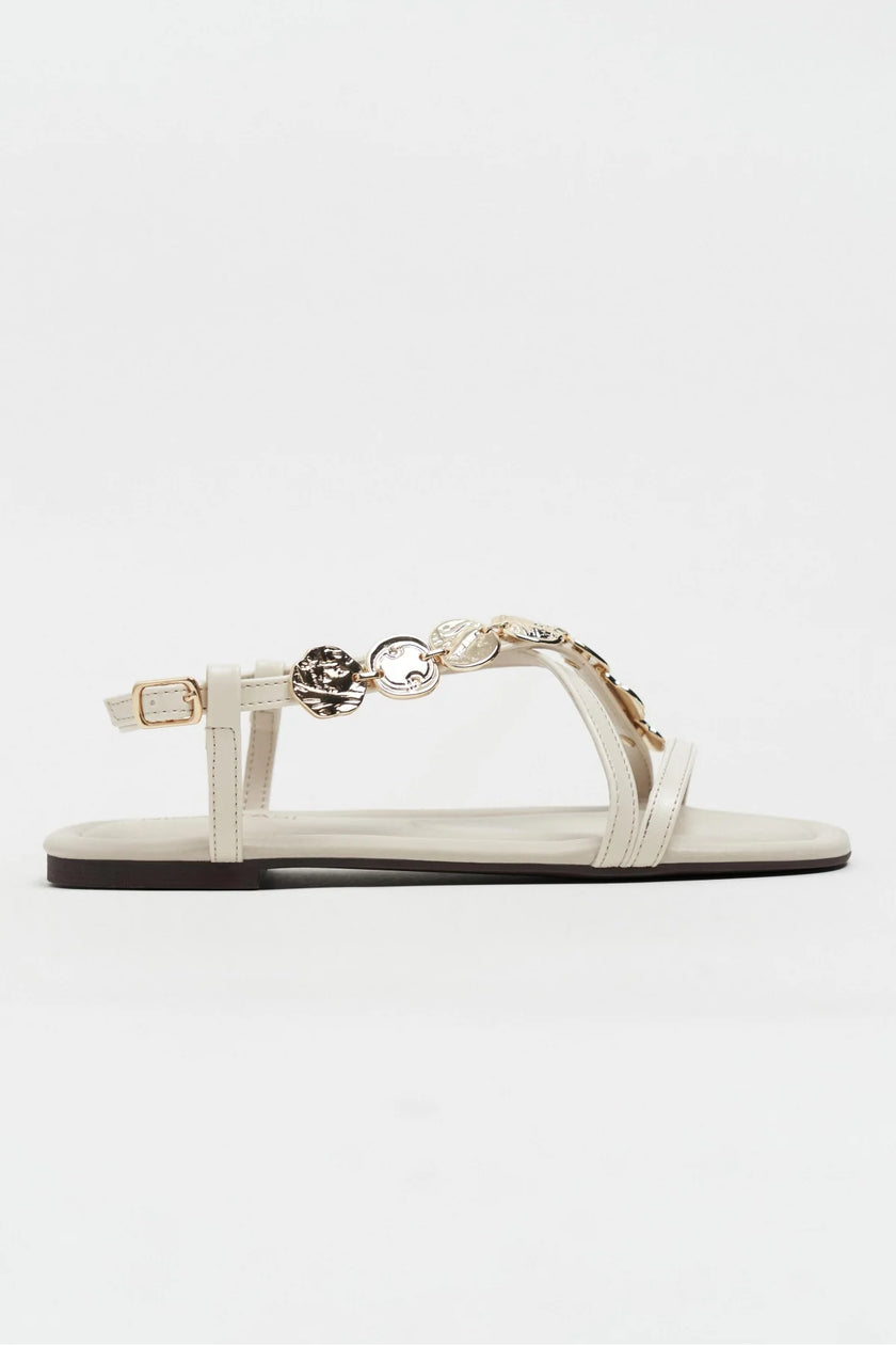 SELENE BEIGE CROSS-STRAP FLAT WOMEN’S SANDALS WITH GOLD ACCENT