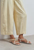 SELENE BEIGE CROSS-STRAP FLAT WOMEN’S SANDALS WITH GOLD ACCENT