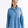 قميص نسائي أزرق مطرز دانتيل على كتف واحد - One Shoulder Lace Detailed Shirt Blue
