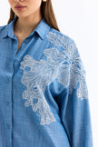 2- قميص نسائي أزرق مطرز دانتيل على كتف واحد - One Shoulder Lace Detailed Shirt Blue