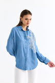 4- قميص نسائي أزرق مطرز دانتيل على كتف واحد - One Shoulder Lace Detailed Shirt Blue