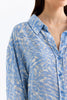 2- قميص نسائي منقوش باللون الأزرق الفاتح - Patterned Shirt Light Blue