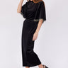 فستان اسود طويل ساده بأكمام مزينة بالأحجار - BLACK SLEEVE STONE DETAIL DRESS